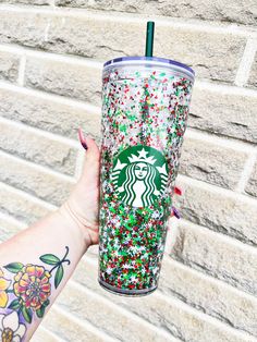 the starbucks cup has sprinkles on it