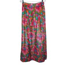 Vintage 1970s Handmade A-line Maxi Skirt, Pink & Green Floral Shimmer Sz M - a-line silhouette  - Shimmering fabric probably polyester  - fully lined  - back zipper with hook and loop closure  Excellent pre-owned condition.  Very well made.  Measurements laying flat  Waist 14" Hips 18" Length 39.5" Relaxed Bohemian Maxi Skirt, Retro Beach Skirt With Lining, Retro Spring Flowy Maxi Skirt, Retro Flowy Maxi Skirt For Spring, Spring Retro Full Maxi Skirt, Retro Flared Maxi Skirt For Spring, Spring Vintage Lined Maxi Skirt, Vintage Lined Maxi Skirt For Spring, Retro Lined Maxi Skirt