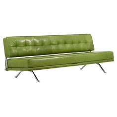 a green leather couch sitting on top of metal legs