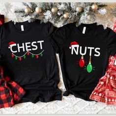 two shirts with the words cheese and nuts on them next to a christmas tree decorated with ornaments