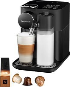 an espresso machine with three different types of coffee