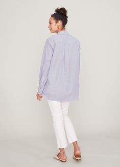 In lightweight cotton shirting, HATCH's spin on the classic button down hits all the marks: a crisp collar, inverted pleat at center back and stiff banded cuffs with a bias body, gusset piecing and a notched hem that flatters as your shape changes.The Classic Buttondown is worn here withThe Maternity Kick Flare Crop. Hatch Maternity, White Stilettos, Pregnancy Wardrobe, Skin To Skin, Pregnancy Stages, Kick Flares, Nursing Bra, Clothing Essentials, New Mom