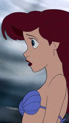 ariel from the little mermaid with red hair and blue dress, looking to her left