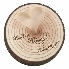 a wooden slice with a heart on it