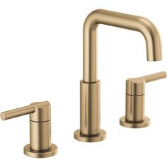 two faucets in brushed brass finish, one is turned on and the other has no handles