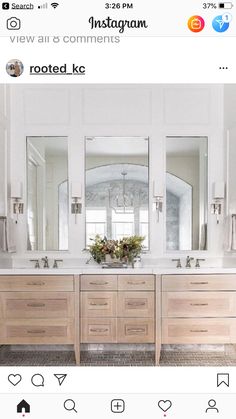 a bathroom with two sinks and mirrors on the wall next to it is an instagram photo