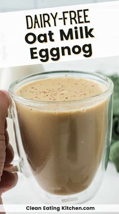 dairy - free oat milk eggnog recipe in a glass mug with text overlay