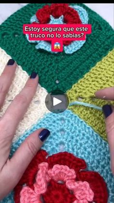 someone is crocheting together to make a flower pot holder for their dishcloths