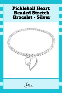 Are you a pickleball fanatic? Get ready to make heads turn on and off the court with this stylish Pickleball Heart Beaded Stretch Bracelet in silver. Celebrate your love for the game and complete your outfit, all for just $34.99!#Borntorally #jewelry #Pickleballbracelet #Pickleball #bracelet #braceletforgirls Pickleball Bracelet, Pickleball Jewelry, Sport Accessories, Bracelet In Silver, Ball Bracelet, Unique Bracelets, Affordable Gifts, Sports Accessories, Beaded Stretch Bracelet