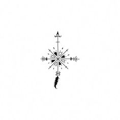 an arrow and compass tattoo design