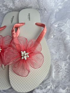 These beautiful white flip flop is hand wrapped in coral satin ribbon, and adorned with a matching organza flower with pistils in the center. Ribbon color is coral if you are needing other colors of ribbon or decoration please contact me and will be happy to accommodate you! All flip flops are handmade to order and the production time is 5-7 business days and then please allow additional time for shipping. Amazing for beach, weddings, flower girl or a fancy event, you choose! Please choose your Beach Wedding Sandals, Fancy Event, Wedding Flip Flops, Sandals Wedding, White Flip Flops, Organza Flowers, Sandals Beach, Bridal Sandals, Wedding Sandals