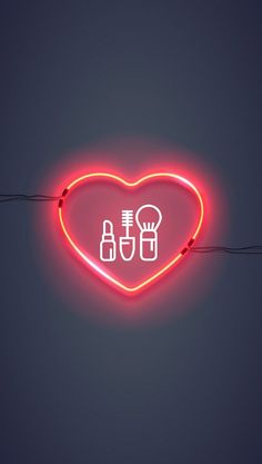 a heart shaped neon sign with an image of a toothbrush and bottle on it