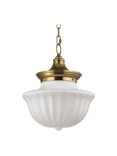 a light fixture with a white glass shade