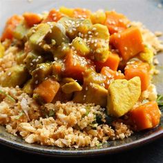 a plate with rice and vegetables on it