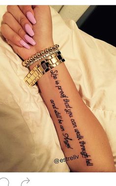 a woman's arm with some writing on it