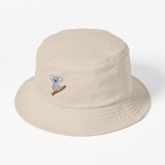 This packable, scrunchable, lightweight headwear classic is ready for adventure, from the beach to the street to the trail Breathable 100% cotton with eyelet ventilation Flat top Moderate brim is 2.2"" (5.5 cm) wide to keep the sun off your face Unstructured crown is 3.1"" (8 cm) deep Easy care: just spot clean and dry in shade. The koala or, inaccurately, koala bear (Phascolarctos cinereus), is an arboreal herbivorous marsupial native to Australia. Cute Koala, Hats For Sale, Koala Bear, Flats Top, The Trail, Koala, Mammals, Bucket Hat, The Sun