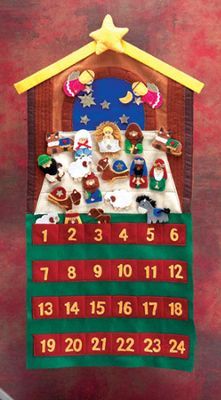 a christmas nativity calendar hanging on a wall