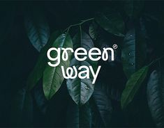 the words green way written in white on top of dark background with lots of leaves