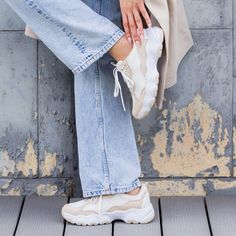 Elevate your look with the street-style inspired sneaker, Boom Joy. This mesh and vegan leather lace-up sneaker features a removable footbed and a lightweight EVA and rubber slip-resistant outsole, keeping you looking good and feeling good all day. Featured in a neutral Ecru colorway on a mesh and vegan leather upper. Cream Lace-up Platform Sneakers For Sports, Cream Lace-up Walking Sneakers, Trendy Textile Sneakers With Laces, Trendy Slip-on Chunky Sneakers For Streetwear, Cream Lace-up Platform Sneakers With Textured Sole, Cream Lace-up Sneakers For Walking, Athleisure Lace-up Platform Sneakers With Textured Sole, Trendy Cushioned Sneakers For Walking, Trendy Walking Sneakers With Cushioned Footbed