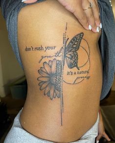 a woman with a butterfly tattoo on her stomach and the words, don't rush your