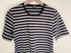 "Vintage Marimekko cotton jersey lyhythiha ( short sleeve) top. Black and gray stripes. Made in Finland, MARIMEKKO Materials - 100 % cotton jersey Size M Measured flat - Shoulder seam to shoulder seam - 37cm (14.56\") Underarm to underarm - 43cm (16.92\") Length - 63cm (23.5\") It is in excellent vintage condition. Real colours may be little different from their appearance on your display. Pleas look at the pictures carefully. I will be happy to answer all of your questions. Feel free to visit m Fitted Short Sleeve Tops With Horizontal Stripes, Fitted Horizontal Stripe Short Sleeve Tops, Black Horizontal Stripe Short Sleeve T-shirt, Fitted Striped Short Sleeve T-shirt, Vintage Marimekko, Dress Pretty, Gray Stripes, Button Art, House Dress