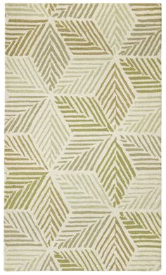 a green and white rug with an abstract design