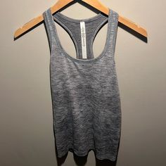 Color: Gray Size: 8 -Slim Fit, Hip Length -Engineered Mesh Is Strategically Placed In High Sweat Area For Breathability Energy Tank, Lululemon Align Tank, Black Racer, Open Back Tank, Lululemon Swiftly Tech, Mesh Tank Top, Lululemon Tank Top, Lululemon Sports Bra, Grey Tank Top