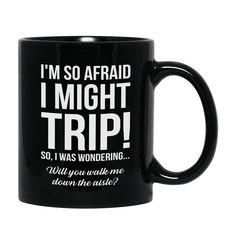 a black coffee mug with the words i'm so afraid i might trip on it