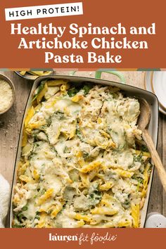 a casserole dish with spinach and artichoke chicken pasta in it