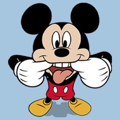 a cartoon mickey mouse sticking his tongue out and making a goofy face while sitting at a table