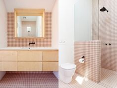 two pictures of a bathroom with pink tiles on the walls, and a white toilet next to a walk in shower