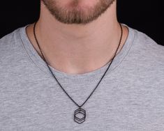 "Trendy new black chain & pendant necklace for men, Classic with a twist. This necklace is made of stainless steal link chain with black plated 3 Hexagon pendant. What a great combo! It can be casual or dressy to wear. You can combine 2 different necklaces together.   Sizes - Necklace Length: 50cm (20\"), Pendant length 2.5 cm (1\"). The necklace comes with 2\" (5 cm) extension chain. This product comes in a jewellery box with the brand's logo and you can ask for gift wrap too (see picture). Col Affordable Symbolic Men's Necklaces, Affordable Men's Pendant Jewelry, Black Hexagon Necklace For Gift, Black Geometric Necklace For Gift, Mens Black Chain Necklace, Hexagon Faceted Necklace For Gifts, Necklace Boyfriend, Boyfriend Gift Ideas, Black Chain Necklace