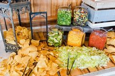 the food is prepared and ready to be eaten on the buffet table for guests at this party