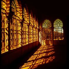 the sun shines through stained glass windows