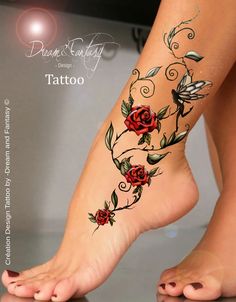 a woman's foot with tattoos on it and roses tattooed on the side of her leg