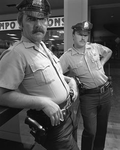 two police officers standing next to each other