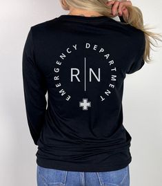 This ER Nurse Shirt Long Sleeve Shirt is perfect for the Emergency Department Nurse. Makes a great gift for the New Nurse Grad Gift too!  **FRONT & BACK PRINT**  **UNISEX SIZING** ♥ W E L C O M E  T O  S K E T C H Y  C A T  D E S I G N S ! ♥ Click here to return to the shop home page ⇒ https://www.etsy.com/shop/SketchyCatDesigns Say hello to your new favorite shirt! These shirts are printed with eco-friendly water-based inks, giving them the softest feel. The design itself is embedded into the f Pre-shrunk Long Sleeve Shirt, Everyday Long Sleeve Shirt With Letter Print, New Grad Nurse, Er Nurse, Nurse Shirt, Emergency Room, Grad Gifts, Long Sleeve Jersey, S K