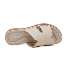 Walk with comfort and style in our Siketu Off the Coast Cushioned Flat Sandals. The perfect blend of fashion and practicality, these sandals provide cushioned support for your feet while boasting a trendy coastal look. Available in apricot, add a touch of whimsy to your summer wardrobe. Cheers to happy feet! 0.98'' heel Slip-on PU upper Synthetic Arch support footbed™ Cushioned Insole™ Anti-skid rubber sole The Coast, Arch Support, Summer Wardrobe, Flat Sandals, Apricot, Rubber Sole, Arch, Walking, Slip On