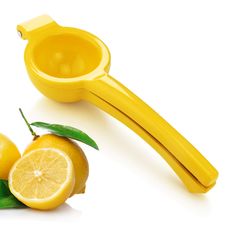 two lemons and a measuring spoon on a white background