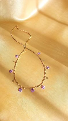 It is a unique product handmade and rhodium plated on stainless steel in purple and gold colors. Decorated with flower figures, the product is an excellent option that you can buy as a gift for your mother and wife. 🥰I add my love and determination to all the products I make. I want to offer people different options by making products that you will especially like and remember me by. Bead Necklace Flower, Necklace Purple, Necklace Elegant, Necklace Flower, Remember Me, Gold Colors, Women Necklace, Steel Necklace, Stainless Steel Necklace