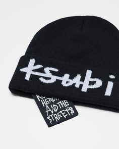 The 1999 Beanie Black/White is a black wool blend beanie. This style features an internal signature Ksubi tag and a white jacquard 1999 Ksubi logo on front. Streetwear Beanie With Letter Print, Hip Hop Beanie For Streetwear In Winter, Hip Hop Beanie For Winter Streetwear, Winter Streetwear Beanie With Letter Print, Winter Streetwear Hats With Letter Print, White Beanie For Streetwear, Letter Print Beanie For Streetwear, Black Beanie With Letter Print For Streetwear, White Beanie Hats For Streetwear