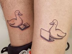 two ducks with books on their legs