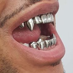 Custom made set of eight caps covers 8 teeth and each canine has a vampire cap. You can choose any teeth on your top or bottom 8 and is available in silver, yellow or white dental gold, 10k, 14k and 18k solid yellow, rose and white gold (not plated). Our quality is guaranteed and comes with a standard shiny/ mirror finish. To add more caps, select the quantity and specify which teeth you want made. Includes free mould kit with two tries and a prepaid return label/ envelope so you do not need to Grillz Teeth, Grills Teeth, Tooth Gem, Gold Teeth, Teeth Jewelry, Mold Kit, Dope Jewelry, Dream Jewelry, Polish Jewelry