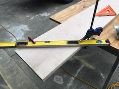 a pair of tools is sitting on top of a table