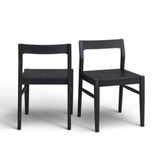 two black chairs sitting next to each other