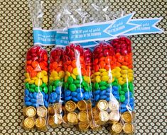 candy bags filled with coins and rainbow candies