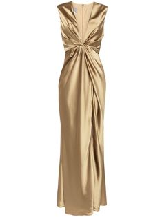 a gold dress on a mannequin neckline with a knot at the back