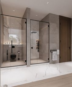 a modern bathroom with marble walls and flooring