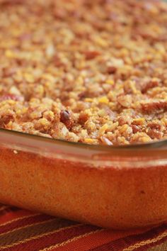 a casserole dish filled with food sitting on a table