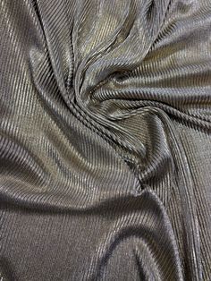 an up close shot of a metallic fabric